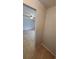 View of the tiled entry foyer leading into a spacious living area with a ceiling fan at 3433 Soho St # 101, Orlando, FL 32835
