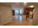 Open floorplan shows living space with built-in desk and kitchen with breakfast bar at 3433 Soho St # 101, Orlando, FL 32835