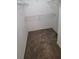 Walk-in closet with shelving and neutral carpeting at 3433 Soho St # 101, Orlando, FL 32835