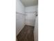 Walk-in closet featuring neutral carpeting and multiple wire shelves at 3433 Soho St # 101, Orlando, FL 32835