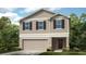 Charming two-story home featuring a neutral color palette, attached two-car garage, and professionally landscaped yard at 404 Wayland Dr, Haines City, FL 33844