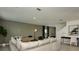 Inviting living room with neutral tones, modern lighting, and comfortable seating arrangements at 404 Wayland Dr, Haines City, FL 33844