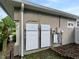 A home exterior featuring a Tesla solar battery system is an environmentally conscious upgrade at 405 Carriage Way Ct, Oviedo, FL 32765