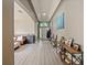 A bright foyer showcases the open floor plan, hardwood floors, and modern neutral paint scheme at 405 Carriage Way Ct, Oviedo, FL 32765