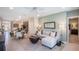 Inviting living room seamlessly connects with the kitchen and dining area in an open layout at 4176 Sagefield Dr, Harmony, FL 34773