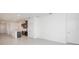 Open-concept living space with tile flooring and ample natural light from the sliding glass doors at 4176 Sagefield Dr, Harmony, FL 34773