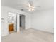 Bedroom with access to the bathroom and closet, offering modern comfort at 435 Tradition Ln, Winter Springs, FL 32708