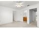 Bedroom showing the doorway to the bathroom and a closet for ample storage at 435 Tradition Ln, Winter Springs, FL 32708