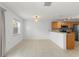 Dining room provides ample space for entertaining and is conveniently situated off the kitchen for easy access at 435 Tradition Ln, Winter Springs, FL 32708