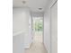 Hallway showing a view into the bedroom, and leading to other rooms at 435 Tradition Ln, Winter Springs, FL 32708