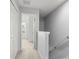 Upstairs hallway includes linen closets and access to all upstairs bedrooms and bathrooms at 435 Tradition Ln, Winter Springs, FL 32708