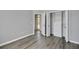 Bedroom with wood laminate flooring, closet, and pool view at 4536 Barrister Dr, Clermont, FL 34711