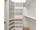 Walk-in closet with shelving and drawers to maximize storage space at 4536 Barrister Dr, Clermont, FL 34711