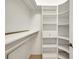 Walk-in closet with shelving and drawers to maximize storage space at 4536 Barrister Dr, Clermont, FL 34711