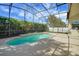 Sparkling screened-in pool with patio in a private backyard at 4536 Barrister Dr, Clermont, FL 34711