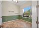 Inviting room with large window, tile floors and decorative molding at 4536 Barrister Dr, Clermont, FL 34711