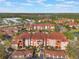 Beautiful aerial view showcases a community of condos, set among lush greenery and mature trees at 5578 Metrowest Blvd # 310, Orlando, FL 32811