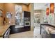 Eat-in kitchen with granite countertops, stainless steel appliances, and modern light fixtures at 5578 Metrowest Blvd # 310, Orlando, FL 32811