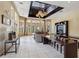 This spacious lobby features plenty of comfortable seating, natural light, and a modern ceiling fan at 5578 Metrowest Blvd # 310, Orlando, FL 32811