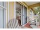 Cozy balcony with seating, offering a glimpse of the interior and outdoor scenery at 6403 Parc Corniche Dr # 4204, Orlando, FL 32821