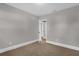 Neutral bedroom with carpet, and a doorway leading to other parts of the home at 719 Se 24Th St, Ocala, FL 34471