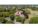 Aerial of the home's location within a leafy community with mature trees at 7230 Westpointe Blvd # 1222, Orlando, FL 32835