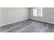 Cozy bedroom featuring ample natural light and modern flooring, perfect for relaxation at 7230 Westpointe Blvd # 1222, Orlando, FL 32835