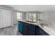 Gourmet kitchen with granite countertops, stainless dishwasher, and stylish cabinetry at 7230 Westpointe Blvd # 1222, Orlando, FL 32835