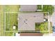 An aerial view of the home shows the roof line, landscaping, and relation to neighboring properties at 750 Sterling Spring Rd, Orlando, FL 32828