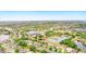 An aerial shot showcasing the property's location in a well-maintained neighborhood with water views at 750 Sterling Spring Rd, Orlando, FL 32828