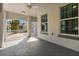 Inviting covered front porch with ceiling fan and view of the driveway at 778 Gainer Way, Winter Springs, FL 32708