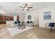 Comfortable living room with tile floors, modern furnishings, and a ceiling fan at 778 Gainer Way, Winter Springs, FL 32708