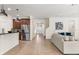 Open concept living area with kitchen view, tile floors, and comfortable seating at 778 Gainer Way, Winter Springs, FL 32708