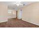 Cozy loft with plush carpeting, a ceiling fan, and a view of the staircase at 778 Gainer Way, Winter Springs, FL 32708