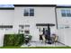 Well-maintained backyard with patio, grill, and privacy fence, offering a great outdoor living space at 808 Grandin St, Davenport, FL 33837