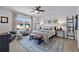 Bright and airy bedroom featuring a large window and modern decor at 808 Grandin St, Davenport, FL 33837