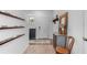 Inviting entryway with decor and wood-look flooring, plus a convenient cabinet and mirror at 808 Grandin St, Davenport, FL 33837