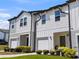 Charming two-story home with well-manicured landscaping, showcasing curb appeal at 808 Grandin St, Davenport, FL 33837