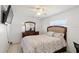 Inviting bedroom with natural light, tiled flooring, and neutral decor at 825 Keats Ave, Orlando, FL 32809
