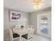 Cozy dining area featuring a view of the pool, a round table, and seating for four at 825 Keats Ave, Orlando, FL 32809