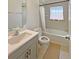 Clean bathroom with updated vanity, shower, and fixtures, offering a refreshing and functional space at 827 Dennis Ave, Orlando, FL 32807