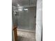 Bright bathroom with a tiled shower stall and large vanity at 831 N Fern Creek Ave # 101, Orlando, FL 32803