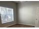 Spacious bedroom featuring wood-look floors, natural light and a ceiling fan at 831 N Fern Creek Ave # 101, Orlando, FL 32803