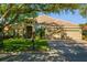 Charming single-story home with a well-manicured lawn and a spacious three-car garage at 8912 Heritage Bay Cir, Orlando, FL 32836