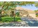 Beautiful single-story home with manicured lawn and mature shade tree at 8912 Heritage Bay Cir, Orlando, FL 32836