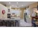 Modern kitchen featuring stainless steel appliances, granite countertops, and an open design leading to other living spaces at 8912 Heritage Bay Cir, Orlando, FL 32836