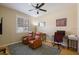 Bright office featuring hard wood floors, a comfortable desk and chair, and an abundance of light at 8912 Heritage Bay Cir, Orlando, FL 32836