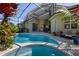 Relaxing pool and spa surrounded by lush landscaping and a screened enclosure for year-round enjoyment at 8912 Heritage Bay Cir, Orlando, FL 32836