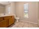 Functional bathroom features tile flooring, vanity with ample storage space and a shower-tub combination at 935 Gloucester Court, Kissimmee, FL 34758