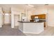View of the kitchen featuring a breakfast bar and ample counter space at 935 Gloucester Court, Kissimmee, FL 34758
